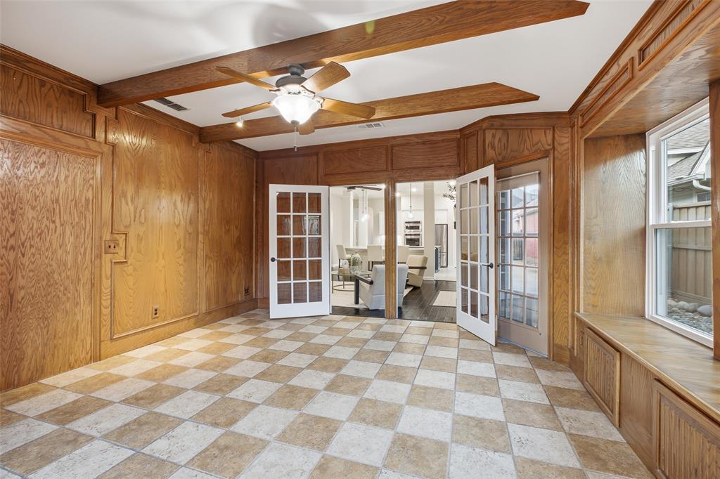 French doors connect the sunroom to the main living area. Flex it as a den, office, playroom or year-round garden room.
