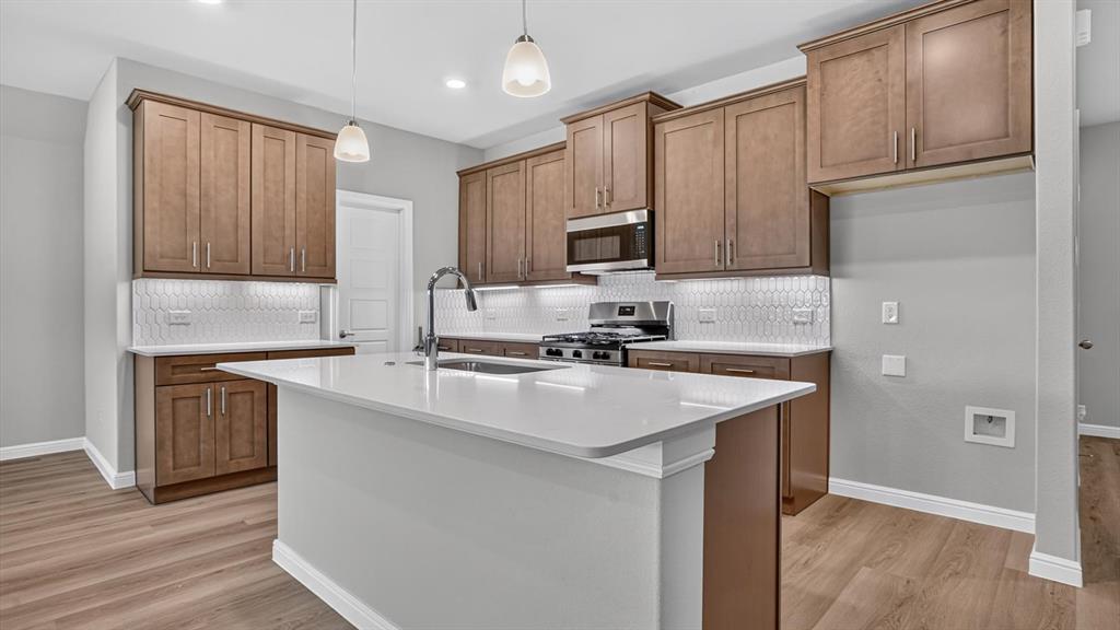 Kitchen - All Home and community information, including pricing, included features, terms, availability and amenities, are subject to change at any time without notice or obligation. All Drawings, pictures, photographs, video, square footages, floor plans, elevations, features, colors and sizes are approximate for illustration purposes only and will vary from the homes as built.