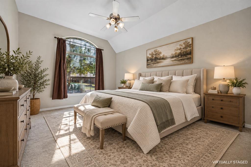 This primary suites spacious and ready to be your retreat.