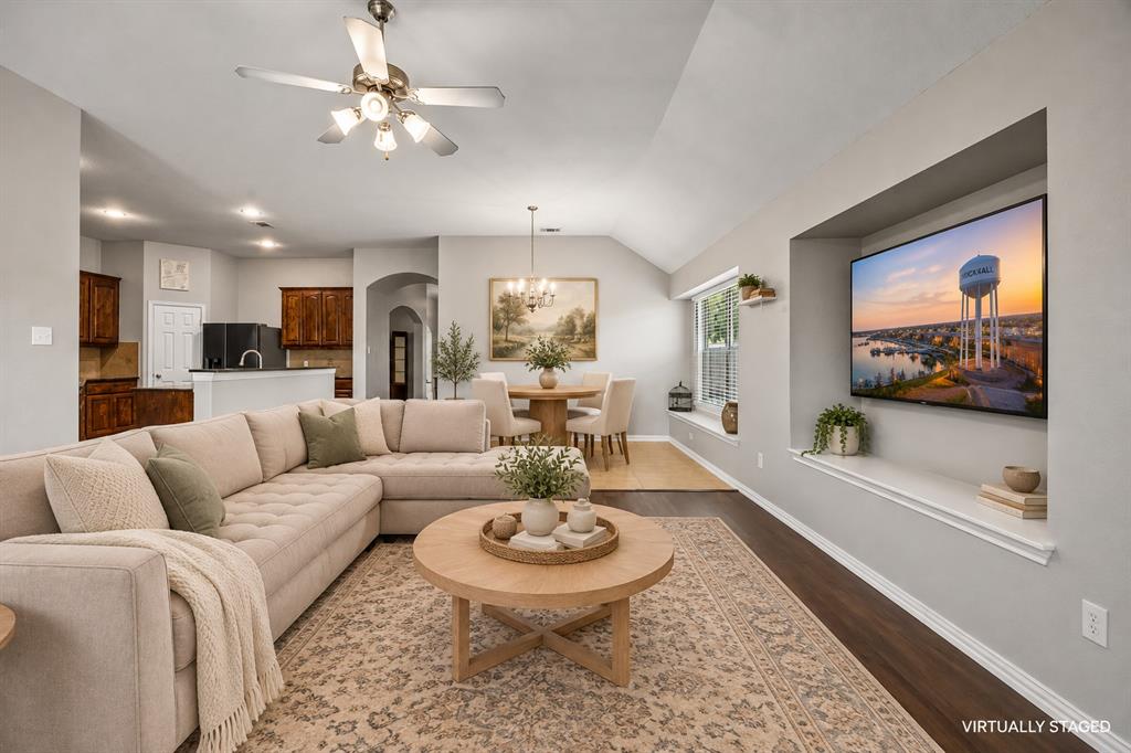 Cozy living room open to the kitchen and breakfast room.