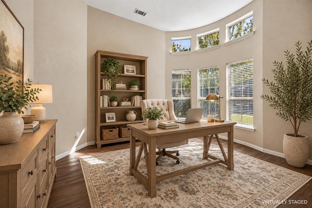 This office could also make a great sitting room. Or add a door in the wall on the left and close in the front opening and make it a 4th bedroom!