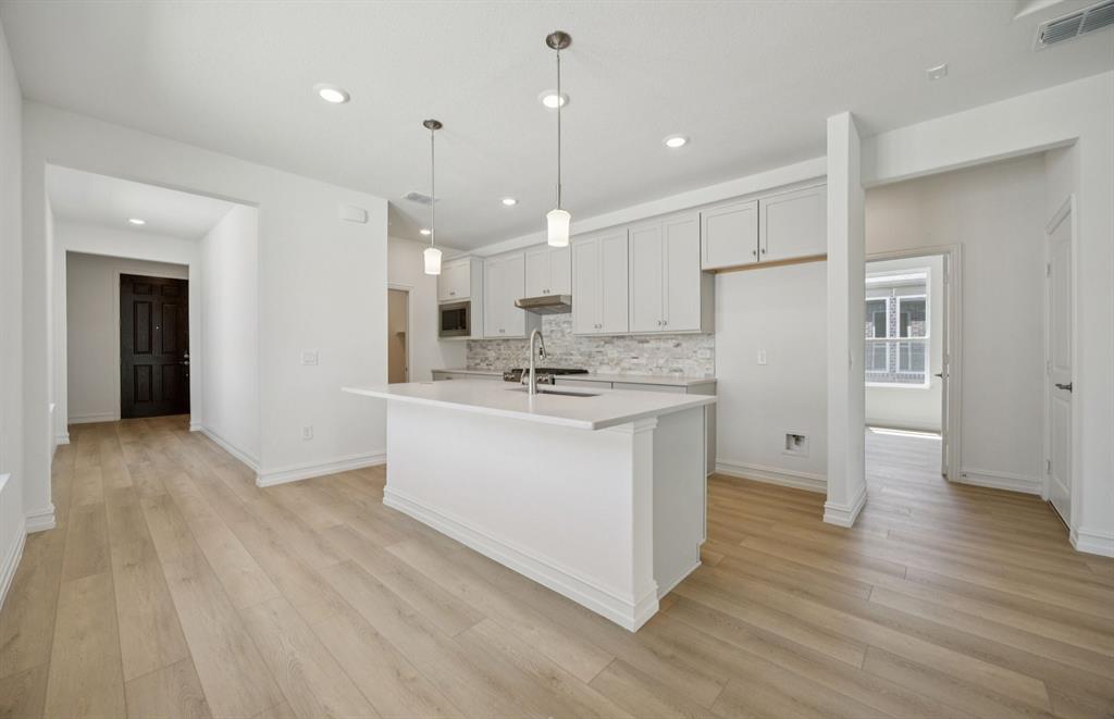 *Floorplan representation, not actual home - Spacious kitchen with eat-in bartop island