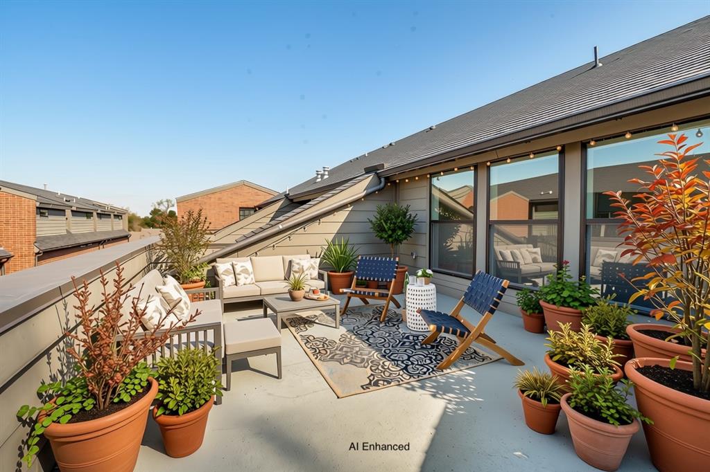 Rooftop terrace featuring horizontal lap siding, expansive windows, and perimeter metal railings