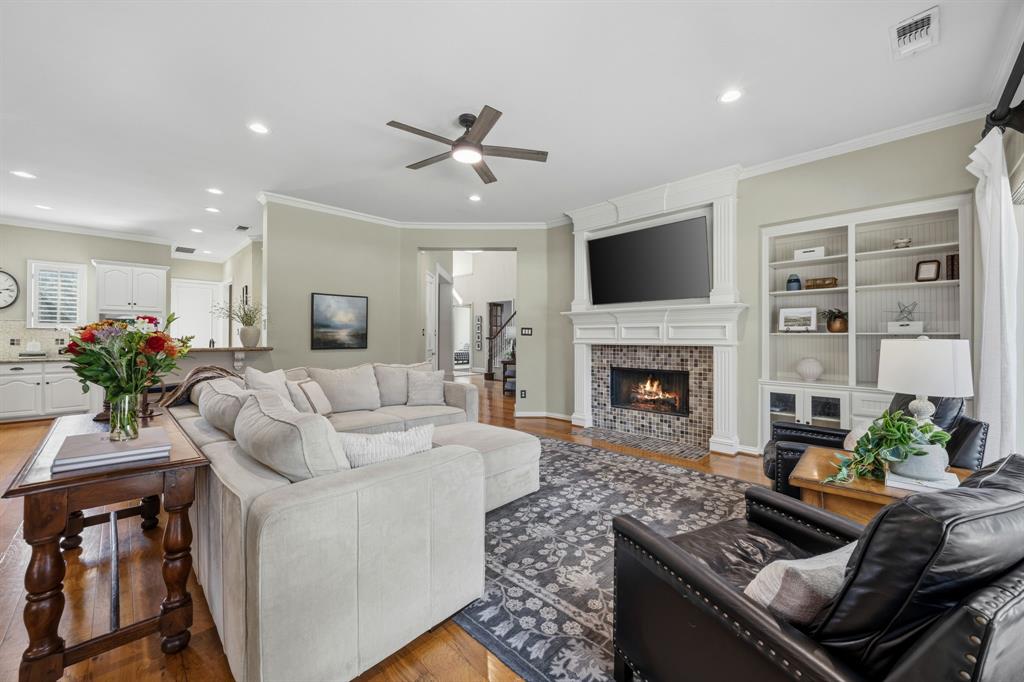 Builts in round out the space- fill with photos and books.