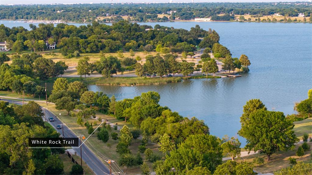 Aerial perspective featuring extensive lake frontage, mature tree canopy, and access to White Rock Trail