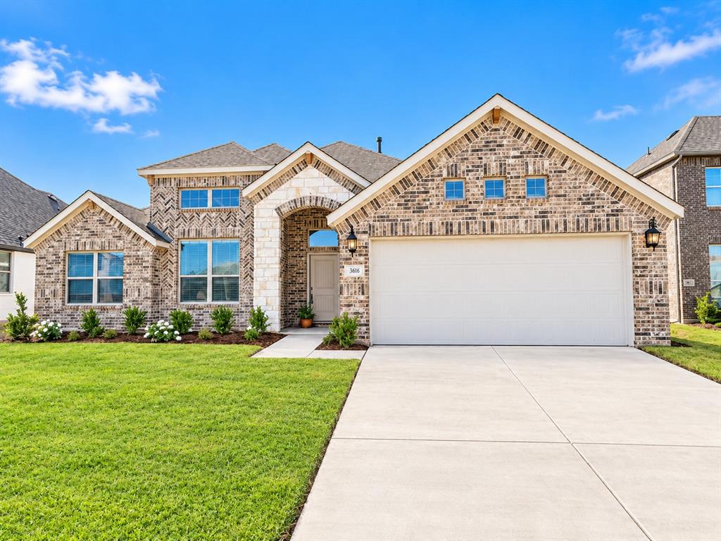 Welcome home to 301 Delaford Drive, a 2021-built brick home with an attached 2-car garage in Eagle Ridge.