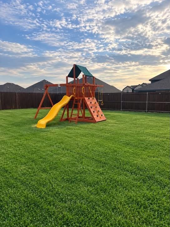Wide-open backyard with endless room to play, garden, or entertain.