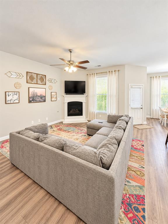 Open-concept living area connects right to the kitchen, perfect for gathering together.