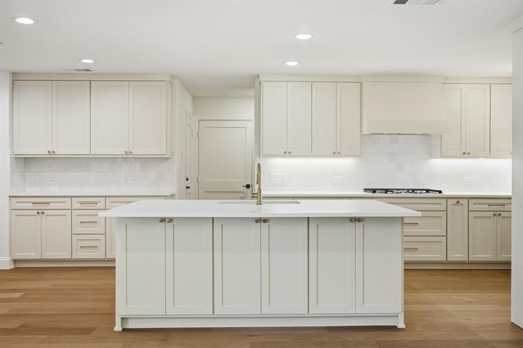 Kitchen featuring an expansive central island
