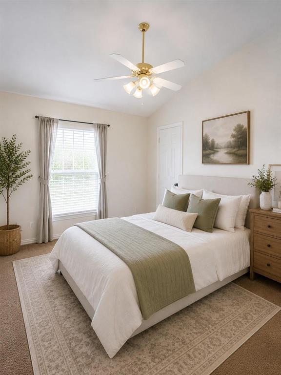 Peaceful bedroom with ceiling fan and room to spread out. Virtually staged.