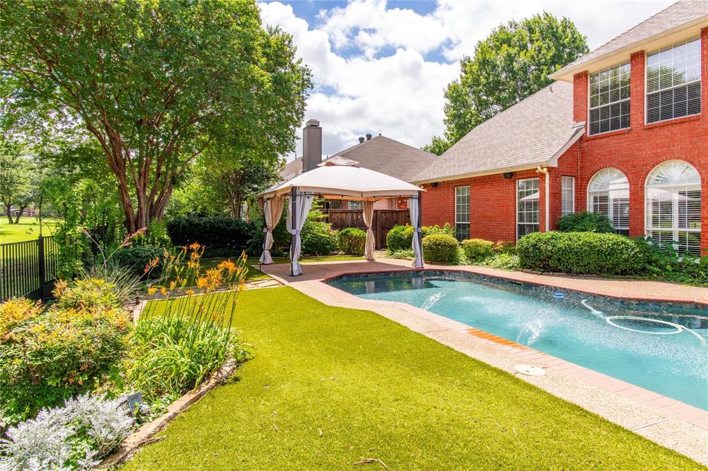Expansive backyard with pool and room to play, garden or entertain.