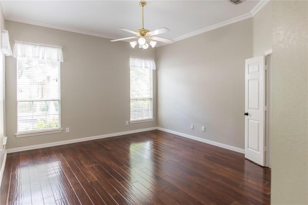 Versatile bonus room with wood floors - ideal home office, study or guest space.