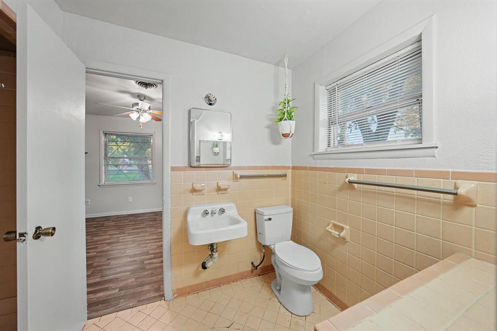 Jack and Jill bathroom conveniently connecting two bedrooms for added functionality and privacy.