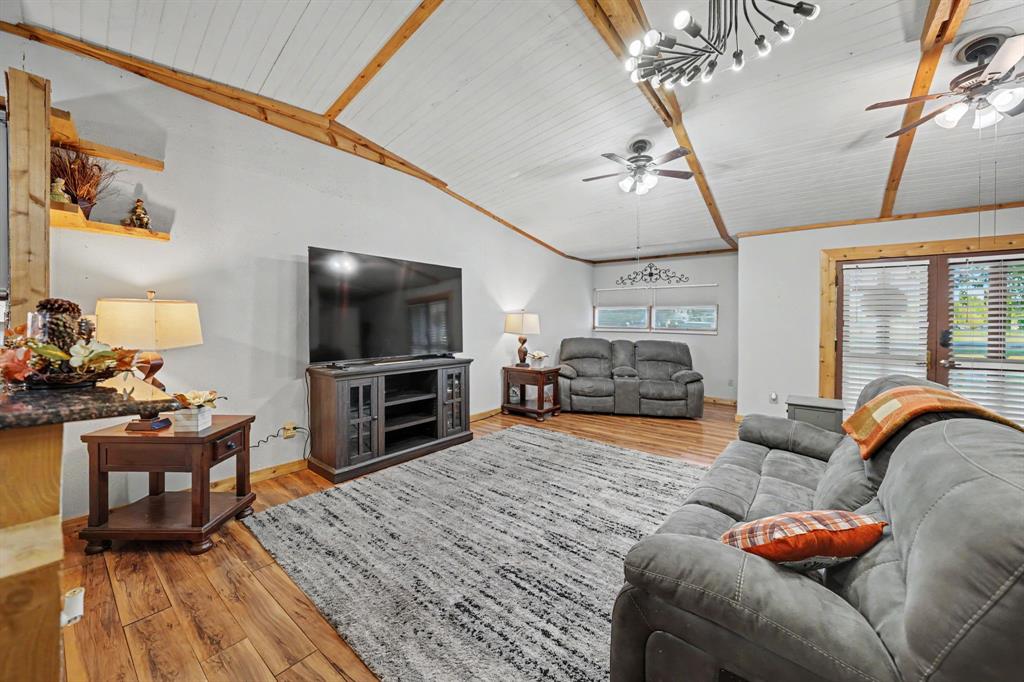 Spacious living room with an open floorplan that flows seamlessly into the kitchen.