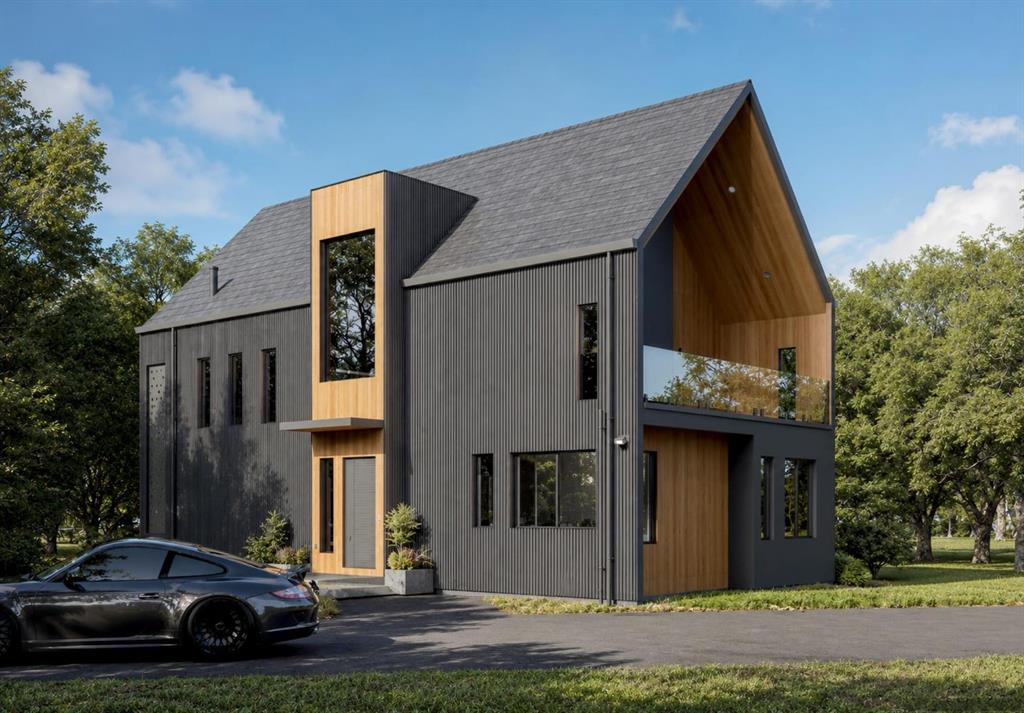 Contemporary exterior featuring a mix of dark vertical siding and wood-tone accents, a steep-pitched gable roof, a recessed upper-level balcony with a glass railing, and vertical rectangular windows