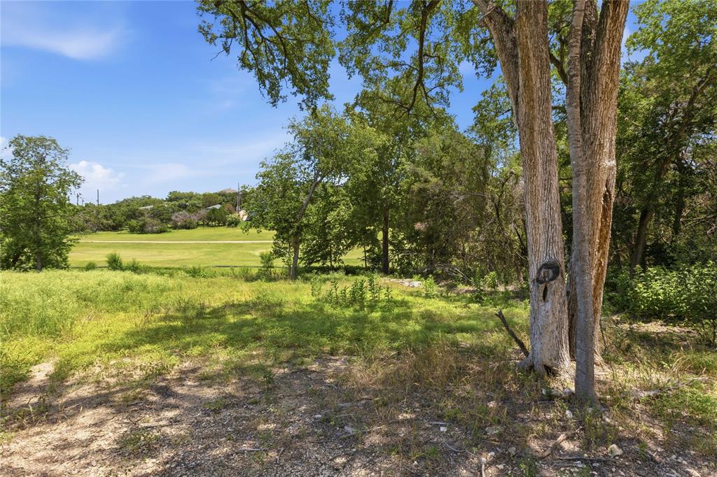 Expansive acreage featuring mature trees and natural landscape