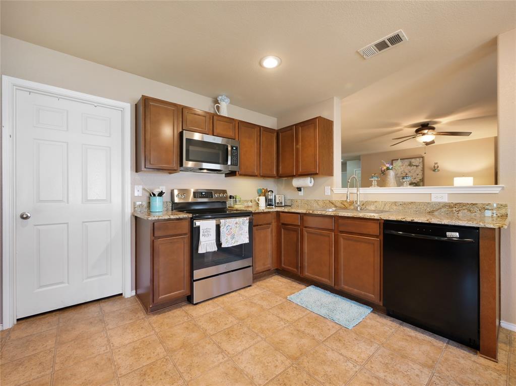 Solid granite counter top with a drop in sink
