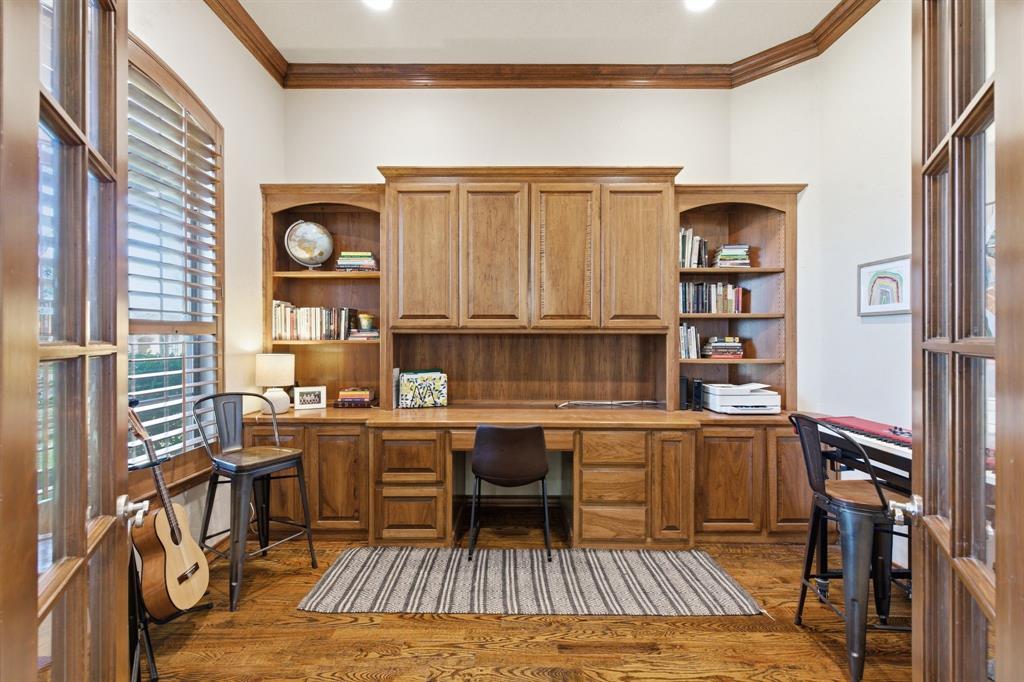 Dedicated office space with beautiful built-in desk and shelfs.  Lake views right outside the window.