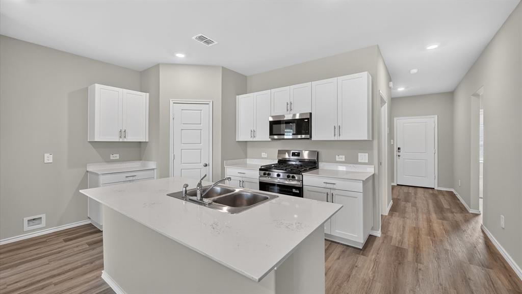 Kitchen - All Home and community information, including pricing, included features, terms, availability and amenities, are subject to change at any time without notice or obligation. All Drawings, pictures, photographs, video, square footages, floor plans, elevations, features, colors and sizes are approximate for illustration purposes only and will vary from the homes as built.