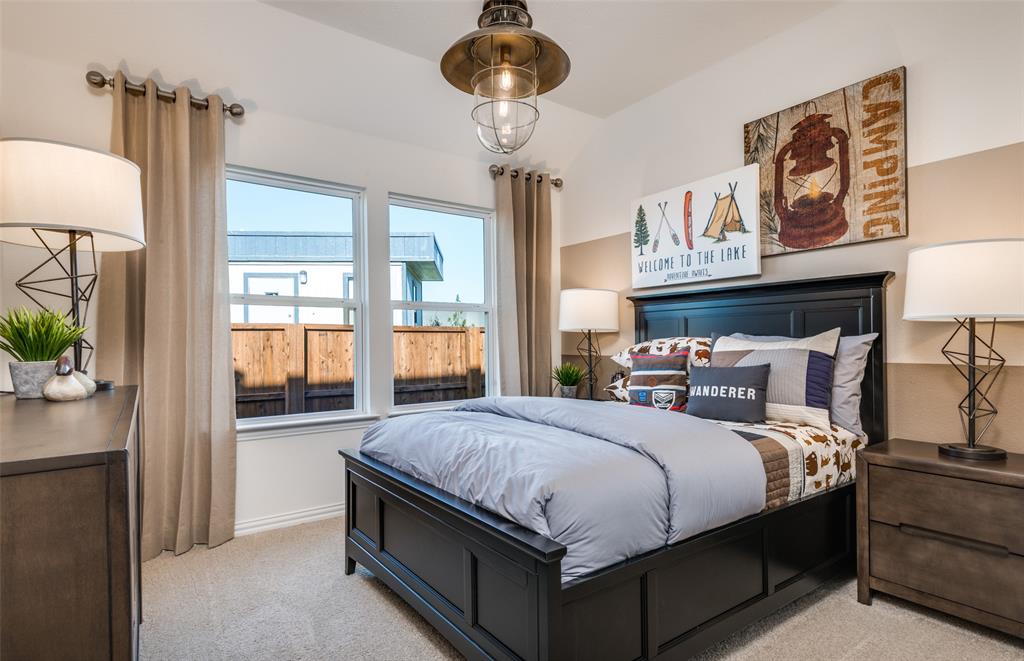 *Model Representation - Spacious secondary bedroom with large windows
