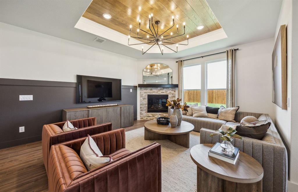 *Model Representation - Spacious gathering room with large windows