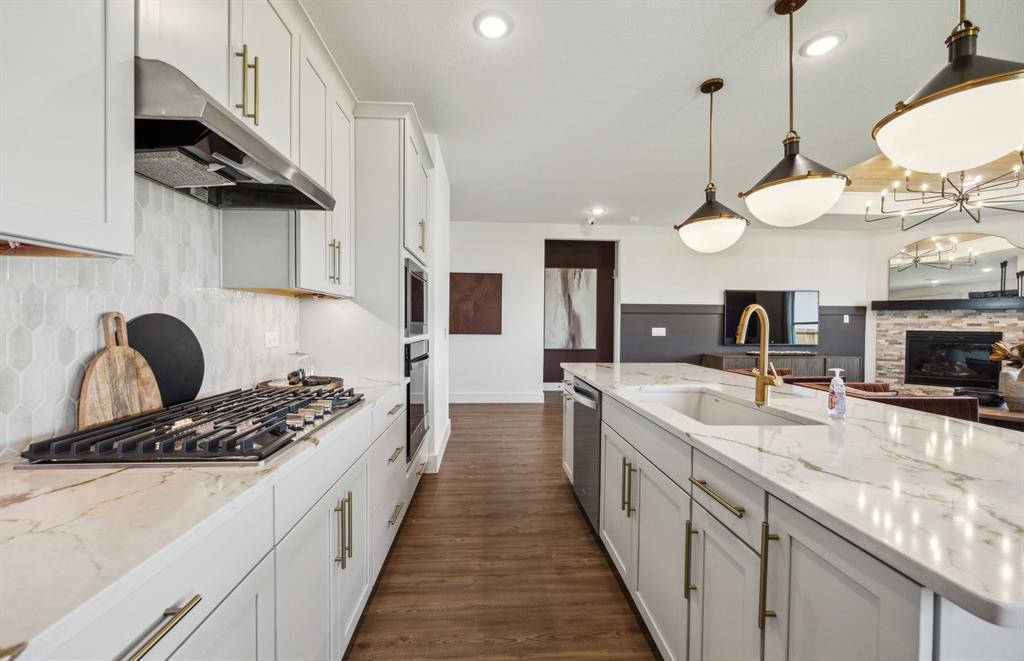*Model Representation - Large island gathering room and dining areas overlooking
