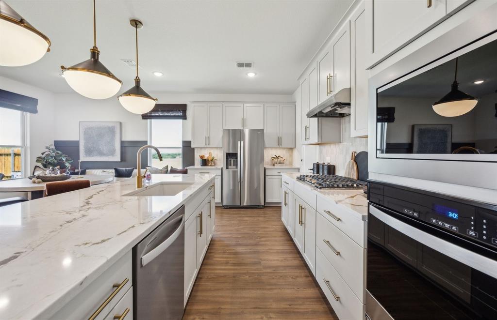 *Model Representation - Abundant cabinet space in kitchen