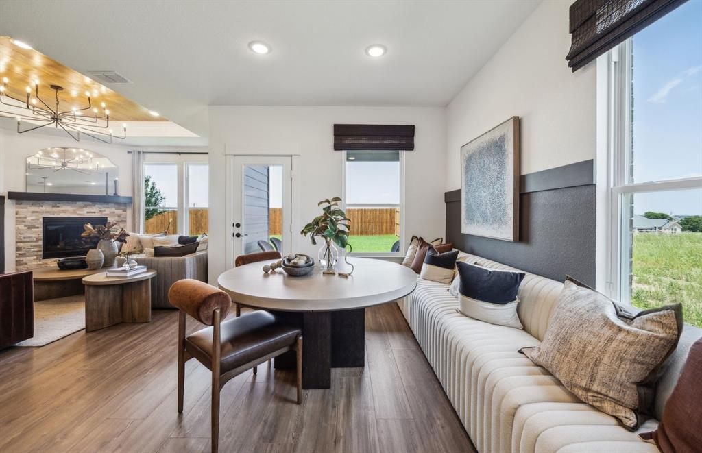 *Model Representation - Dining area off kitchen with large windows
