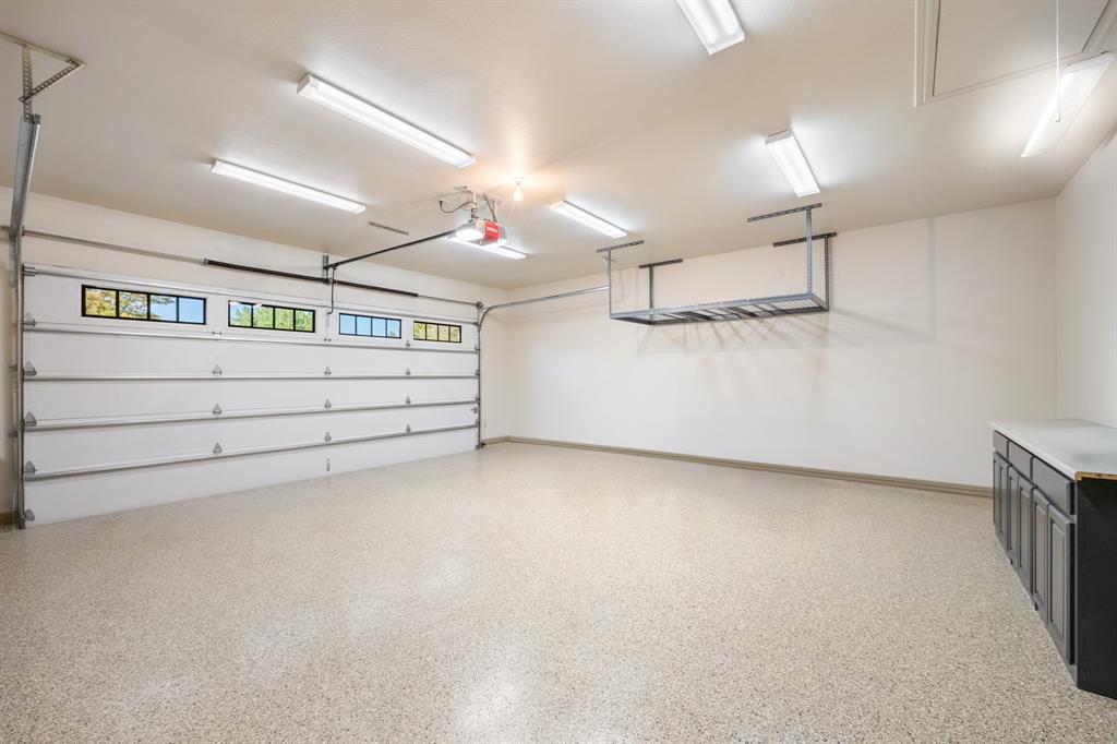 Oversized Garage with Storage and Epoxy flooring