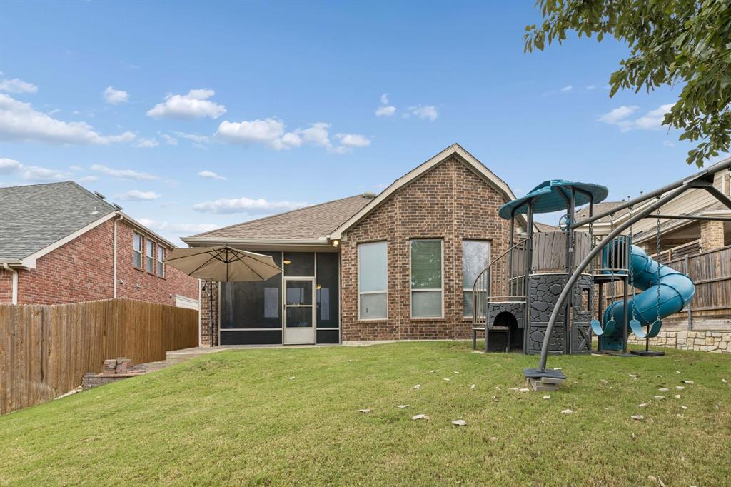 Welcome to the beautiful backyard! Enjoy lush green grass, a fully fenced yard, and plenty of room to play, relax, and enjoy the outdoors.