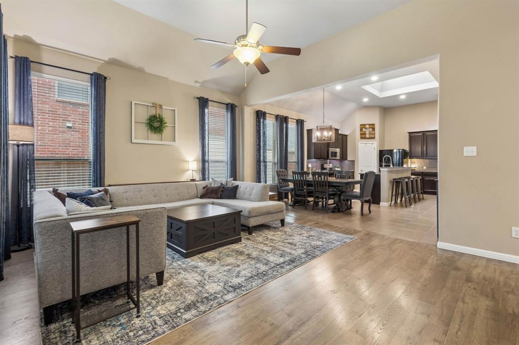 View of the living room showing the seamless flow throughout the home.