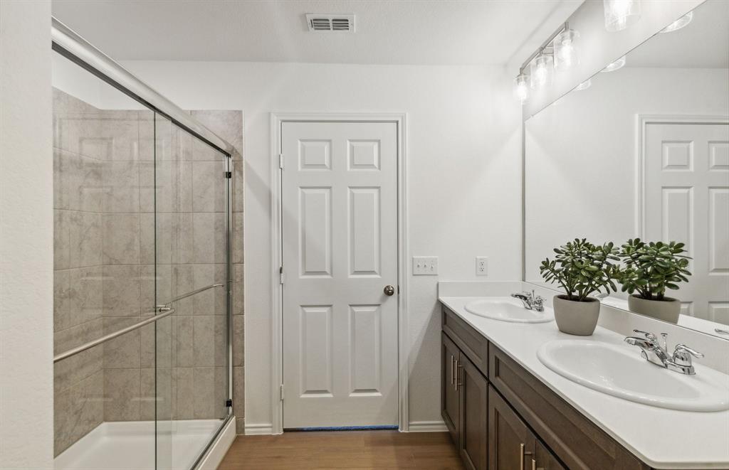 *Model Representation - Owner's private bath with double vanity