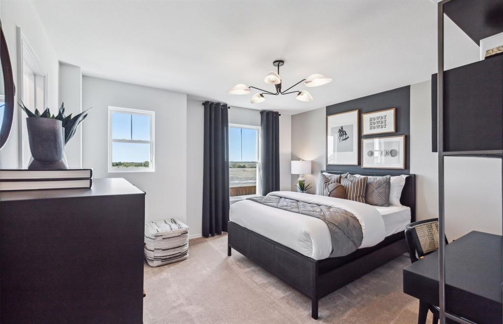 *Model Representation - Spacious secondary bedroom with large windows