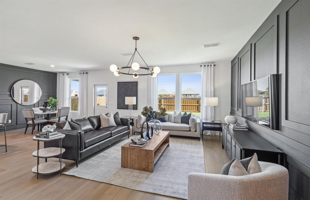 *Model Representation - Gathering room with view of main living areas