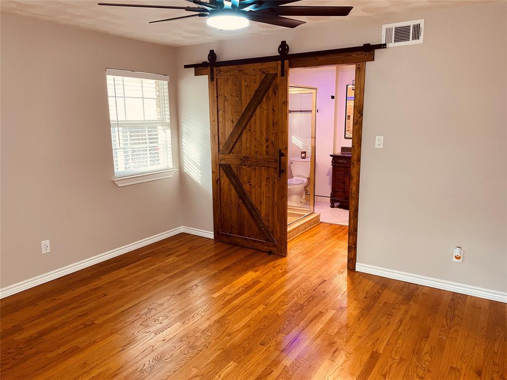 Master Bedroom, looking into the Master Bathroom through the new barn door