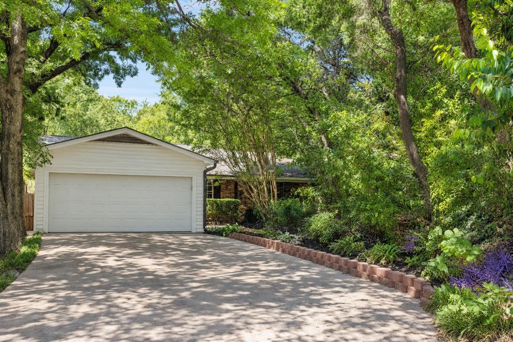 Welcome to this home shaded with mature trees.