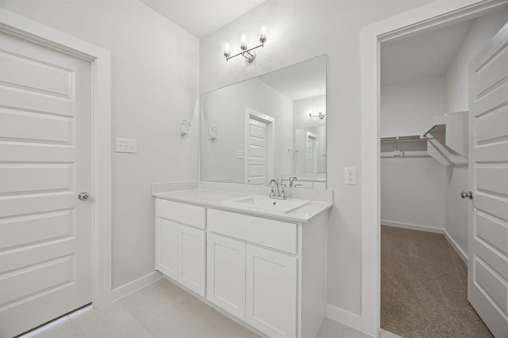 Primary Bathroom in the Masters home plan – REPRESENTATIVE PHOTO