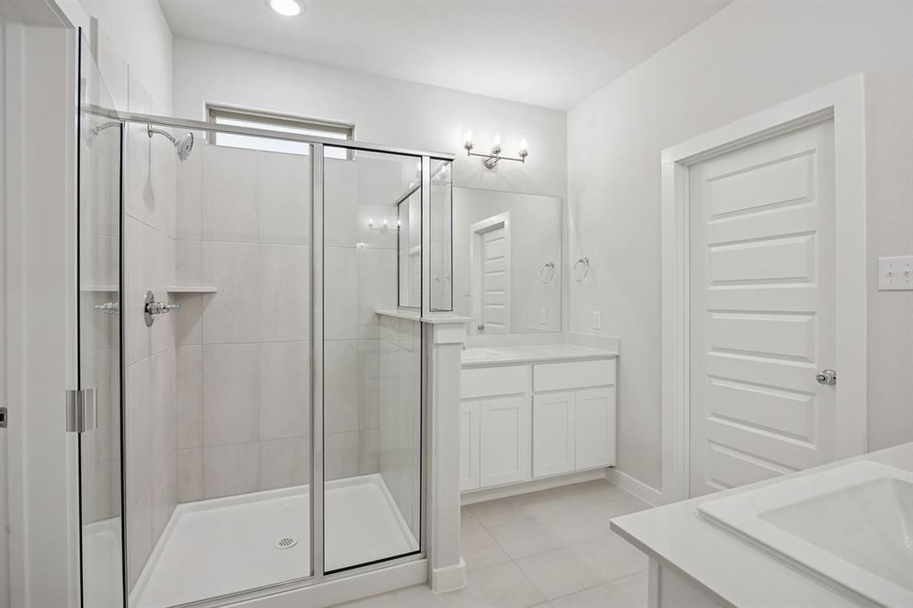 Primary Bathroom in the Masters home plan – REPRESENTATIVE PHOTO