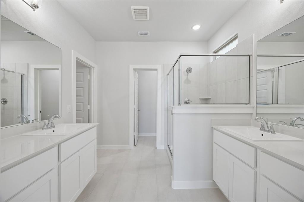 Primary Bathroom in the Masters home plan – REPRESENTATIVE PHOTO