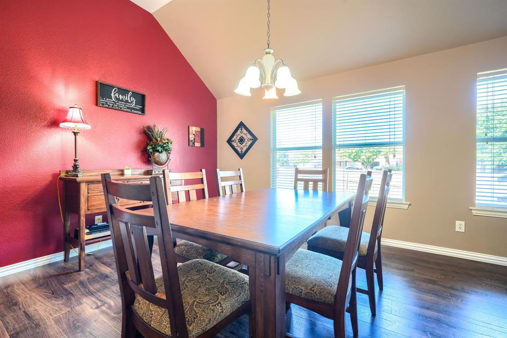Vaulted ceilings, wood-finish flooring, and natural light from triple windows Vaulted ceilings, wood-finish flooring, and natural light from triple windows
