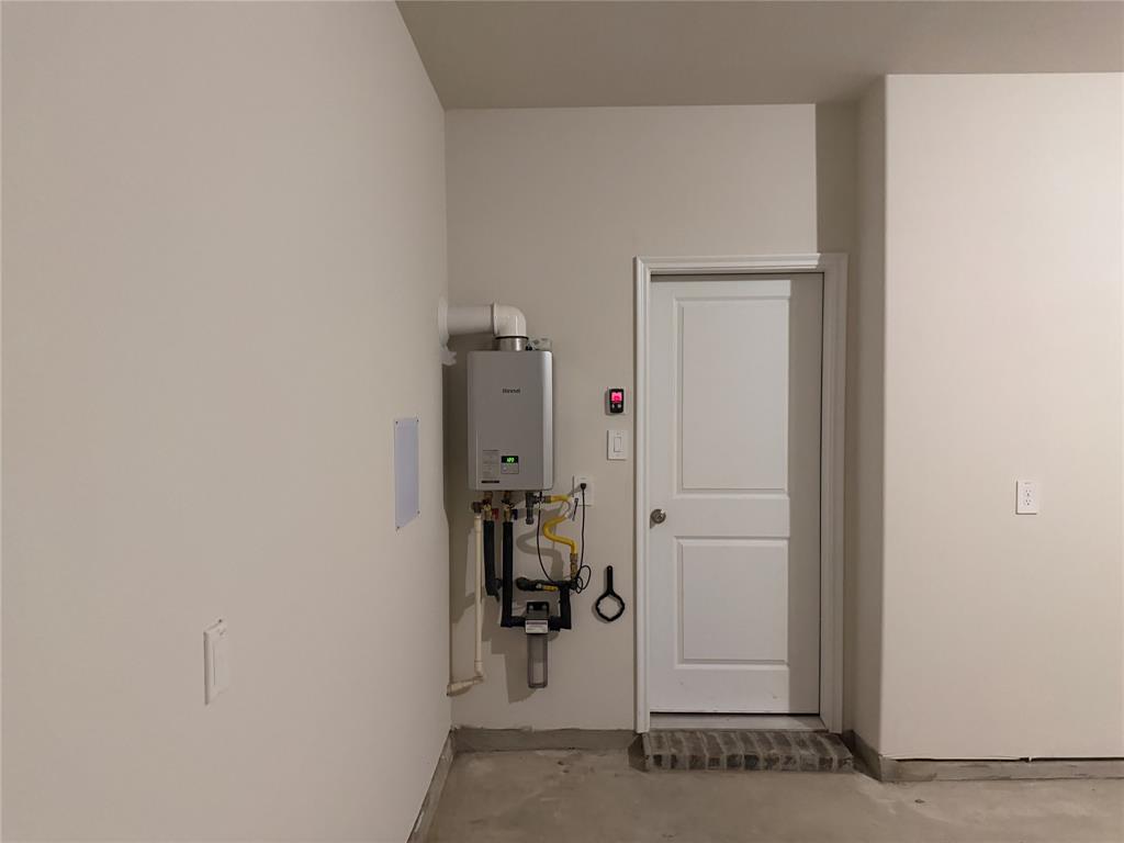 Tankless water heater with mounted digital control unit and dedicated water filtration system