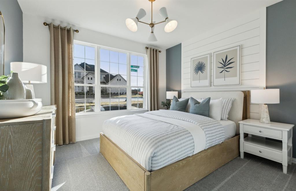 *Model Representation - Spacious secondary bedroom with large windows