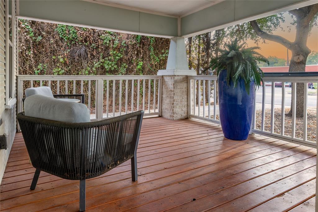 Inviting front porch is perfect for sitting and watching the world go by. Inviting front porch is perfect for sitting and watching the world go by.
