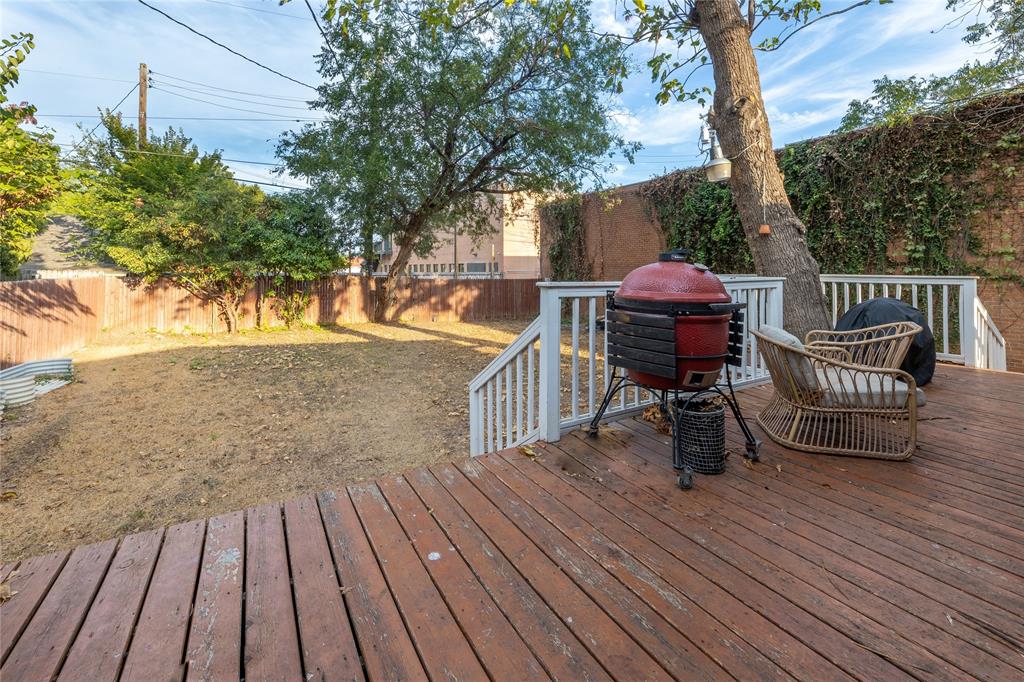 Back yard with privacy fence and deck