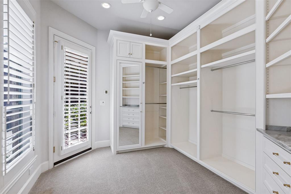 This is just part of "her" closet, showcasing the natural light and thoughtfulness of the design.