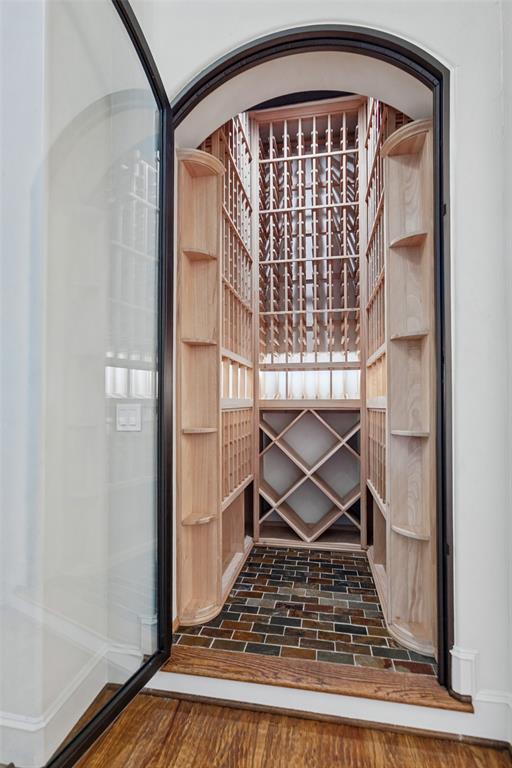 Climate controlled wine closet was custom designed and installed. A Solara glass door was designed to complement the front entry doors.