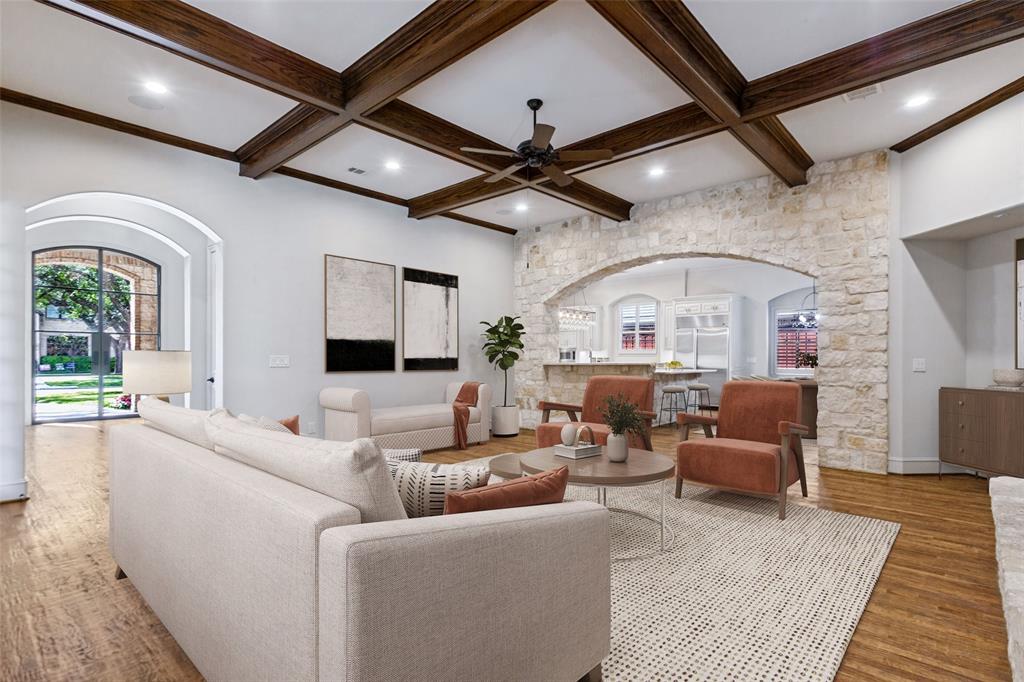 Virtually staged Family Room offers great space in the hub of the home. It enjoys full access to the kitchen beyond.