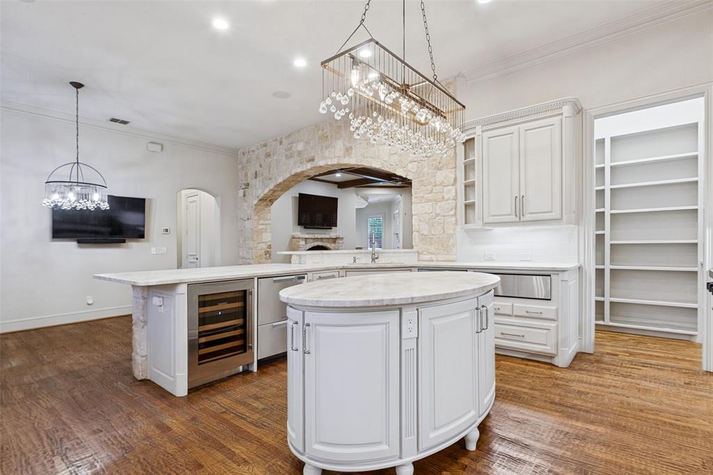 View of Kitchen towards Breakfast Room and Family Room.