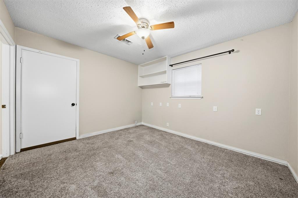 Office located off garage.