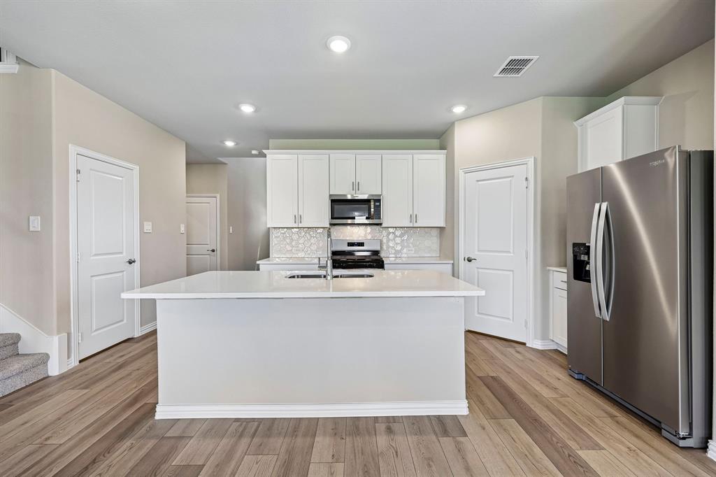 Photo is not of the actual home, but is an inspirational photo of builder’s model home and may depict options, furnishings, and/or decorator features that are not included.